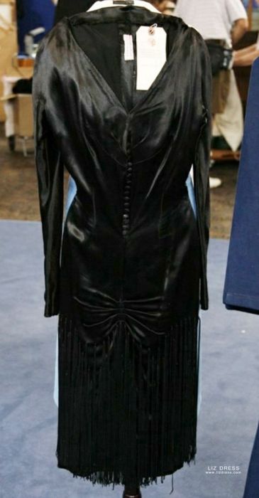 black dress with fringe hem