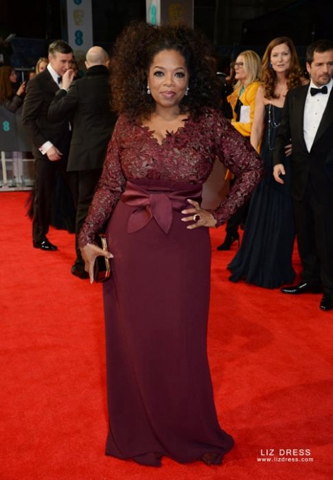 Oprah Winfrey shows off her new trim figure at the Golden Globes red carpet  after admitting